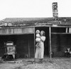 Migrant Mother, C1930. /Na Mother Holding Her Baby In Front Of Her Shack In The Rural South. Photograph, C1930. Poster Print by Granger Collection - Item # VARGRC0016592