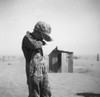 Dust Bowl, 1936. /Na Farmer'S Young Son Covering His Mouth During A Dust Storm In Cimarron County, Oklahoma. Photograph By Arthur Rothstein, April 1936. Poster Print by Granger Collection - Item # VARGRC0124098