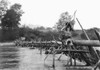 Hupa Fisherman, 1923. /Na Hupa Native American In California, Catching Fish With A Fishing Weir Over The Trinity River In California. Photograph By Edward Curtis, 1923. Poster Print by Granger Collection - Item # VARGRC0118287