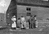 Migrant Family, 1916. /Nthe Hazel Family Posing In Front Of Their Dilapidated Farmhouse. Photographed In Bowling Green (Vicinity), Kentucky On 10 November 1916 By Lewis Hine. Poster Print by Granger Collection - Item # VARGRC0106890