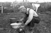 Shantytown, 1938. /Nmigrant Worker Using A Washbin To Clean The Dishes Near His Shack In A Shantytown Near New Iberia, Louisiana. Photograph By Russell Lee, November 1938. Poster Print by Granger Collection - Item # VARGRC0121700