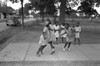 Girls Playing, 1938. /Na Group Of African American Girls Playing On A Rural Sidewalk In Lafayette, Louisiana. Photograph By Russell Lee, October 1938. Poster Print by Granger Collection - Item # VARGRC0121699