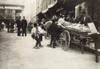 Boston: Thieves, 1909. /Ntwo Boys Stealing From A Pushcart Vendor, Boston, Massachusetts. Photographed By Lewis Hine, October 1909. Poster Print by Granger Collection - Item # VARGRC0107447