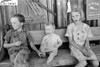 Migrant Children, 1939. /Nchildren Of Agricultural Day Laborers Sitting In Front Of Small Store Near Vian, Oklahoma. Photographed By Russell Lee, June 1939. Poster Print by Granger Collection - Item # VARGRC0185475