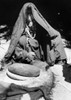 Egypt: Bedouin Woman. /Na Bedouin Woman Grinding Flour In Sinai, Egypt. Photograph, Early Or Mid 20Th Century. Poster Print by Granger Collection - Item # VARGRC0169805