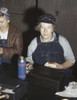 Railroad Worker, 1943. /Nmrs. Elibia Siematter, A Sweeper At The Roundhouse Of The Chicago And North Western Railroad In Clinton, Iowa. Photograph By Jack Delano, May 1943. Poster Print by Granger Collection - Item # VARGRC0352750