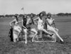 Golfing, 1926. /Nwomen Wearing Bathing Suits, Sitting On A Block Of Ice On A Golf Course. Photograph, 1926. Poster Print by Granger Collection - Item # VARGRC0265379