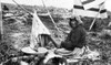 Alaska: Eskimo Woman. /Nan Eskimo Woman Sitting Outside Cleaning Hair Off Of A Hide, Nome, Alaska. Photograph, C1929. Poster Print by Granger Collection - Item # VARGRC0121515