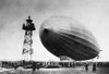 Graf Zeppelin. /Nthe German Airship 'Graf Zeppelin' Approaching Its Mooring Mast In Berlin, Germany, Early 20Th Century. Poster Print by Granger Collection - Item # VARGRC0014171