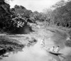 India: Malaria Prevention. /Na Team Of Men In India Dusting Both Banks Of A Small Stream With Insecticide To Prevent Malaria. Photograph, C1929. Poster Print by Granger Collection - Item # VARGRC0123672