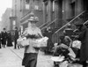 Christmas Dinner, 1908. /Nwomen Carrying Baskets Containing Christmas Dinner From The Salvation Army. Poster Print by Granger Collection - Item # VARGRC0106731