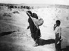 Hopi Farmer, C1900. /Na Hopi Woman Sowing Grain At A Pueblo In Northeastern Arizona. Photographed C1900. Poster Print by Granger Collection - Item # VARGRC0173426