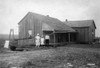 Migrant Family, 1913. /Na Dilapidated 'Renters' Home Near West, Texas. Photograph By Lewis Hine, November, 1913 . Poster Print by Granger Collection - Item # VARGRC0106695