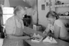 New Mexico: Store, 1940. /Nlois Stagg And Her Mother Looking At Greeting Cards In Pie Town, New Mexico. Photograph By Russell Lee, 1940. Poster Print by Granger Collection - Item # VARGRC0351544