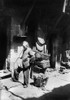 San Francisco: Chinatown. /Na Chinese Man Smoking A Long Pipe In Rag Pickers Alley In Chinatown, San Francisco, California. Photograph, C1921. Poster Print by Granger Collection - Item # VARGRC0116481