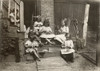 Hine: Home Industry, 1912. /Na Mother With Her Six Children Working On Garment Tags On A Tenement Stoop In Roxbury, Massachusetts. Photograph By Lewis Hine, August 1912. Poster Print by Granger Collection - Item # VARGRC0167536