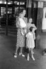 Streetcar Terminal, 1939. /Na Mother With Children Trying To Locate The Streetcar They Want To Catch At The Streetcar Terminal In Oklahoma City, Oklahoma. Photograph By Russell Lee, July 1939. Poster Print by Granger Collection - Item # VARGRC0124302