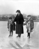 Ice Skaters, C1919. /Na Woman Identified As Miss Dorthy With Two Children Identified As Mcconels And Leigh Ice Skating On A Lake In Washington D.C. Photograph, C1919. Poster Print by Granger Collection - Item # VARGRC0118901