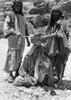 Jordan: Bedouin Ritual. /Ntwo Bedouins Perform A Healing Ritual Over A Sick Man, At Petra, Jordan. Photograph, 1920S Or 1930S. Poster Print by Granger Collection - Item # VARGRC0169814