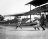 George H. Ruth (1895-1948). /Nknown As Babe Ruth. American Professional Baseball Player, Swinging At A Pitch, With Garret Catching. Photograph, 1920. Poster Print by Granger Collection - Item # VARGRC0121351