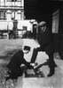 London: Bootblack, C1900. /Nbootblack At Work Outside The Entrance To A Railway Station In London, England. Photographed C1900. Poster Print by Granger Collection - Item # VARGRC0094443