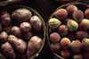Potatoes And Peaches. /Na Bushel Of Potatoes And A Bushel Of Peaches At The French Market In New Orleans, Louisiana. Photographed C1974. Poster Print by Granger Collection - Item # VARGRC0162709