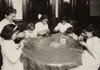 Hine: Home Industry, 1912. /Na Woman And Children Sitting Around A Table Making Chains For Handbags In A Tenement Apartment In New York City. Photograph By Lewis Hine, November 1912. Poster Print by Granger Collection - Item # VARGRC0167524