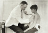 Hine: Doctor, 1924. /Na Doctor Examining A Young Worker In The Infirmary At The Cheney Silk Mill In South Manchester, Connecticut. Photograph By Lewis Wickes Hine, 1924. Poster Print by Granger Collection - Item # VARGRC0268285