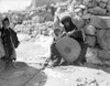 Jordan: Bedouin Weaving. /Na Bedouin Woman Weaving A Straw Mat, Accompanied By Two Young Boys, At Umm Qais, Jordan. Photograph, 1920S Or 1930S. Poster Print by Granger Collection - Item # VARGRC0169808