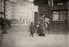 Hine: Home Industry, 1912. /Na Woman And Son Carrying Clothing For Home-Work Near Astor Place In New York City. Photograph By Lewis Hine, February 1912. Poster Print by Granger Collection - Item # VARGRC0167518