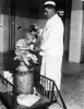 Ellis Island: Milkman, 1925. /Na Milkman Pouring Milk For A Young French Immigrant Detained At Ellis Island, Awaiting Deportation. Photograph, 1925. Poster Print by Granger Collection - Item # VARGRC0185796