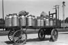 Milk Jugs, 1941. /Nrailway Cart Loaded With Containers Of Milk, Caldwell, Idaho. Photograph By Russell Lee, July 1941. Poster Print by Granger Collection - Item # VARGRC0121263
