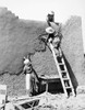 New Mexico: Adobe House. /Nreplastering An Adobe House At Chamisal, New Mexico. Photograph, 1940, By Russell Lee. Poster Print by Granger Collection - Item # VARGRC0033288