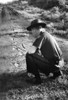 Border Patrol Inspector. /Nan American Border Patrol Inspector Reads Tracks Left By Illegal Immigrants. Photograph, 1957. Poster Print by Granger Collection - Item # VARGRC0093391