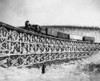 Alaska: Railroad, 1916. /Nrailroad Train As It Crosses The Fox Gulch Bridge, Alaska. Photograph, 1916. Poster Print by Granger Collection - Item # VARGRC0116049