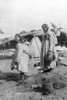 Alaska: Eskimos, C1916. /Ntwo Eskimo Mothers Standing Outside Their Tents, Each Carrying A Child On Their Back, Alaska. Photograph, C1916. Poster Print by Granger Collection - Item # VARGRC0121422