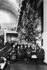Ellis Island: Christmas, 1920. /Ngroup Of Immigrant Children Photographed In Front Of A Christmas Tree Inside The Registry Room At Ellis Island, New York City, 1920. Poster Print by Granger Collection - Item # VARGRC0117599