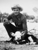 Cowboy, 20Th Century. /Na Cowboy And A Calf. Poster Print by Granger Collection - Item # VARGRC0039773