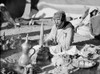 Jordan: Bedouin Man. /Na Bedouin Man Pounds Coffee Into Grounds In Jordan. Photograph, 1920S Or 1930S. Poster Print by Granger Collection - Item # VARGRC0169809