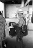 Postman, 1939. /Na Postman With Equipment Waiting To Board A Streetcar At The Terminal In Oklahoma City, Oklahoma. Photograph By Russell Lee, July 1939. Poster Print by Granger Collection - Item # VARGRC0124301