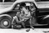 Texas: Oil Workers, 1939. /Noil Field Workers Reading The Newspaper During A Break At Kilgore, Texas. Photograph By Russell Lee, April 1939. Poster Print by Granger Collection - Item # VARGRC0122319