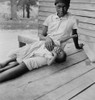 Girls, C1939. /Ngirls From A Sharecropper Family On The Porch Of Their Home In North Carolina. Photograph By Dorothea Lange, C1939. Poster Print by Granger Collection - Item # VARGRC0322263
