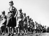 Wwii: Women'S Army Corps. /Nmembers Of The Women'S Army Corps Perform A Drill Wearing Gas Masks At Daytona Beach, Florida, December 1942. Poster Print by Granger Collection - Item # VARGRC0167353