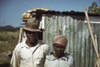 Migrant Workers, 1941. /Nafrican American Couple Standing In Front Of Their Run Down Home, Puerto Rico. Photograph, December, 1941 By Jack Delano. Poster Print by Granger Collection - Item # VARGRC0106680