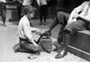 Child Labor: Bootblack, 1924. /Na Young Bootblack At Work Near City Hall Park In New York City. Photograph By Lewis Hine, 1924. Poster Print by Granger Collection - Item # VARGRC0119349