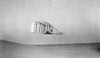 Wright Brothers Glider. /Nwilbur Wright Flying Their Glider, Near The Bottom Of Big Hill, Kitty Hawk, North Carolina. Photographed By Orville Wright, 10 October 1902. Poster Print by Granger Collection - Item # VARGRC0117474