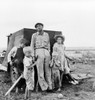 Migrant Family, 1938. /Na Migrant Worker With His Family Camping On The Outskirts Of Perrytown, Texas. Photograph By Dorothea Lange, June 1938. Poster Print by Granger Collection - Item # VARGRC0124151
