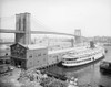 Brooklyn Bridge, C1905. /Nsteamboat Parked At A Marine Terminal Next To The Brooklyn Bridge, New York. Photograph, C1905. Poster Print by Granger Collection - Item # VARGRC0409535