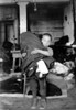 Child Labor, 1910. /Na New York City Tenement Boy With A Bundle Of Garment Work To Be Done At Home, 1910. Poster Print by Granger Collection - Item # VARGRC0003623