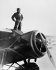 Amelia Earhart (1897-1937). /Namerican Aviator. Photographed With Her Lockheed Vega Monoplane, C1932. Poster Print by Granger Collection - Item # VARGRC0175103